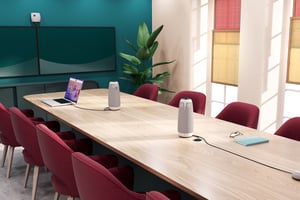 Conference room with two wirelessly paired meeting owls